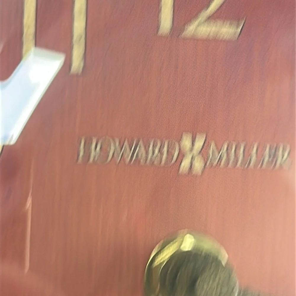 Howard Miller Red Dial Black Metal Table Clock